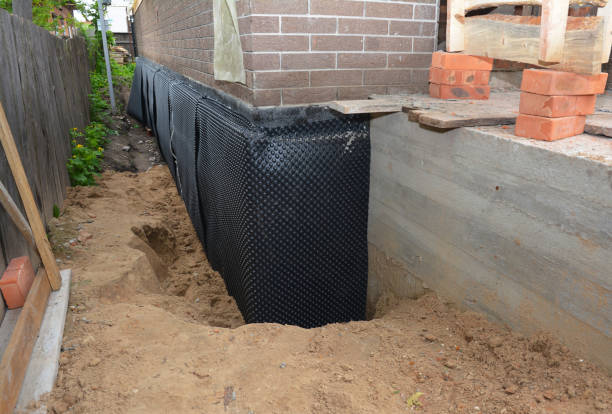 SJ Waterproofing Pros technician performing targeted Foundation Crack Repair assessment in Danville, KY